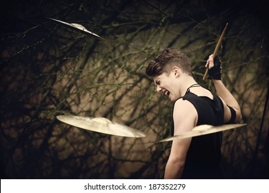 Cymbal In The Air And Drummer