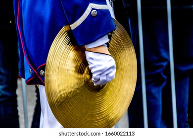 Cymbal Player Marching In A Parade