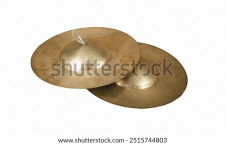Cymbals**: Metal plates that are clashed together or struck with sticks to produce sharp, crashing sounds.