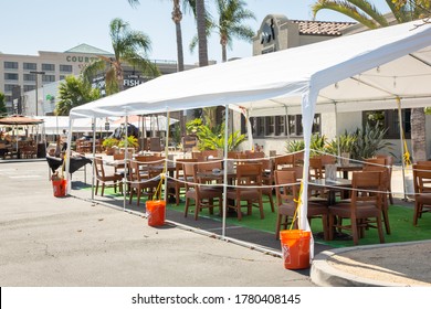 Cypress, California, United States - 07-20-2020: A View Of An Vacant Outdoor Tent Patio Seating Area For A Local El Torito Restaurant, During The Pandemic.