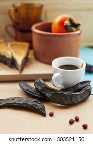 Cyprus Food: Carob Pods, Carob Syrup And Carob Cake. Selective Focus.