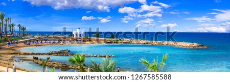 Cyprus island - best beaches. Scenic Louma beach with little church Agios Nikolaos