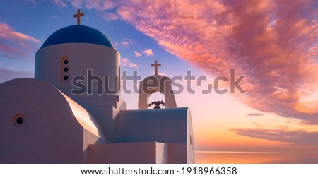 Cyprus. Protaras. Pernera. Fragment of the Church of St. Nicholas in Cyprus. Bell tower of the white Church with blue domes. Orthodox Church on the Mediterranean coast. Christianity.