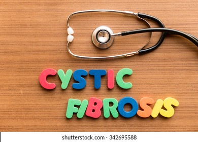 cystic fibrosis colorful word on the wooden background with stethoscope