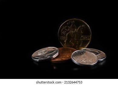 Czech crown  coins of various denominations on a black background - Shutterstock ID 2132644753