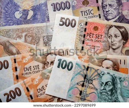 Czech koruna or crown currency banknote background made of paper banknotes of the koruna. Denominations of 1000 Kčs, 500 Kčs, 200 Kčs,  and 100 Kčs notes. Issued by the Czech National Bank.