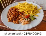 Czech meal - katuv sleh (executioner’s whipping) spicy meat stew with french fries