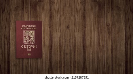 Czech passport on a wooden background ,The Czech passport  is an international travel document issued to nationals of the Czech Republic