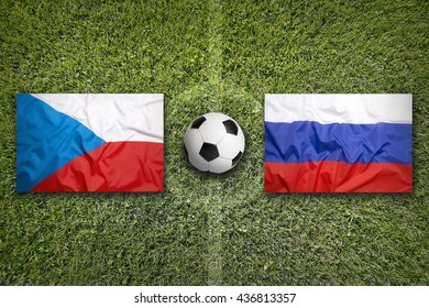 Czech Republic Vs. Russia Flags On Green Soccer Field