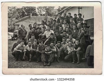 THE CZECHOSLOVAK SOCIALIST REPUBLIC - CIRCA 1950s: Retro Photo Shows Group Of School Boys. Secondary School Boys On School Trip With Teachers. 