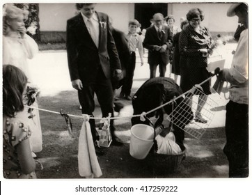 THE CZECHOSLOVAK SOCIALIST REPUBLIC - CIRCA 1970s: Retro Photo Shows Wedding Guests During Rural Wedding Celebration. Black & White Vintage Photography.