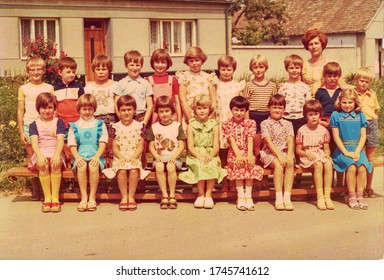 THE CZECHOSLOVAK SOCIALIST REPUBLIC - CIRCA 1980s: Retro photo shows pupils outdoors. They pose for a group photography