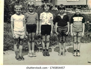 THE CZECHOSLOVAK SOCIALIST REPUBLIC - CIRCA 1980s: Retro photo shows pupils (boys) outdoors. They pose for a group photography. Black & white photo.
