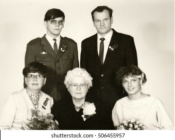 THE CZECHOSLOVAK  SOCIALIST  REPUBLIC - CIRCA 1980s: Vintage Photo Shows Wedding Guests.  One Of Them Wears An Army Uniform. Retro Black & White  Photography.