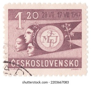 CZECHOSLOVAKIA - 1947 July 20: An 1,20 Korunas Violet-brown Postage Stamp Showing World Federation Of Youth Symbol. World Youth Festival Held In Prague, July 20-Aug. 17