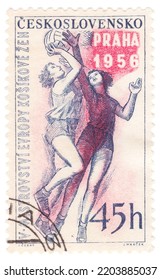 CZECHOSLOVAKIA - 1956 April 25: An 45 Hellers Dark Blue And Carmine Postage Stamp Showing Girl Basketball Players. 5th European Womens’ Basketball Championship