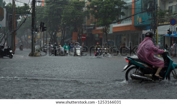  Da Nang city, Vietnam-
December 9/2018, city is flooding in the raining season,a lot of
water in the traffic,flood ed cars,typhoon in Vietnam and heavy
rain