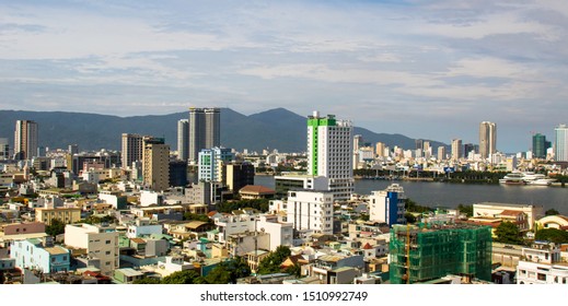 DA NANG, VIETNAM - AUGUST 24, 2019 - Buildings With Mount In The Background