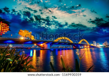 Da Nang, Vietnam: Dragon bridge at sunset which is considered as the icon of Da Nang city.                             