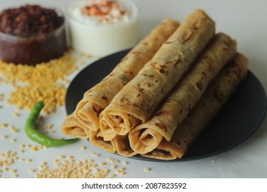 Daal paratha served with garlic chutney and curd. Indian flatbread with lentils and spices. A protein rich version of Indian paratha served with condiment made of garlic and red chillies