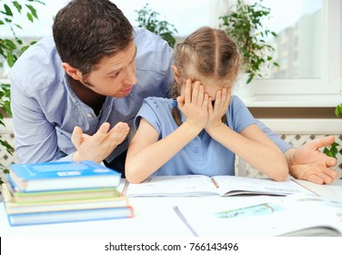 Dad Is Angry Because His Daughter Don't Want To Do Her Homework.