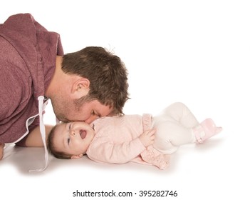 Dad Blowing Rasberries On Babies Cheek Cutout