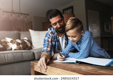 Dad, boy and smile in home for homework in living room for education, learning and support with care. People, parent and kid as family for child development or growth on school project for knowledge - Powered by Shutterstock