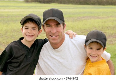 Dad And Boys In Their Baseball Uniforms