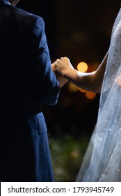 Dad And Daughter Hand In Hand At Wedding