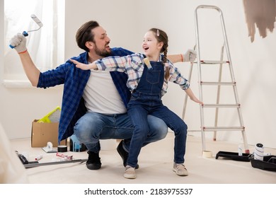 Dad And Daughter Play Fun Games In Room Under Renovation. Husband Is Happy That He Will Finally Be Able To Make Daughter's Wish Come True - To Make New Nursery.