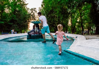 Dad And Daughter Playing Catch-up