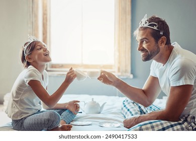 Dad, girl and fun tea party in home with smile, cheers for bonding with fantasy, tiara and support in bedroom. Growth, development and happy man with daughter on bed playing princess game in morning - Powered by Shutterstock