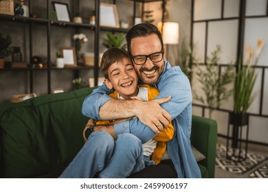 Dad hug son caucasian and share love with him spend time together at home bonding happy together - Powered by Shutterstock