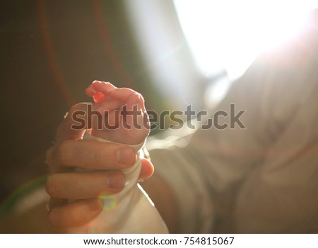 Dad puts his son to bed. before bedtime. dream. a lullaby of songs. soak in the bed.