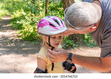 Dad Puts On Daughter Protective Sportswear.