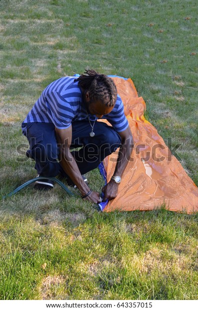 Dad Setting Slip Slide Stock Photo Edit Now 643357015