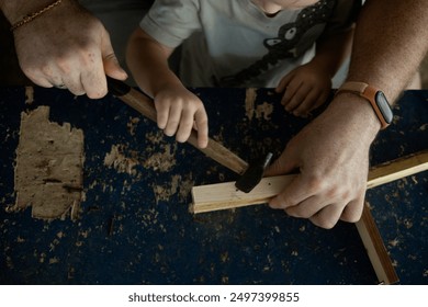 Dad and son do Carpentry together - Powered by Shutterstock