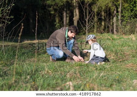 Similar – Image, Stock Photo Little girl putting apple inside of wicker basket