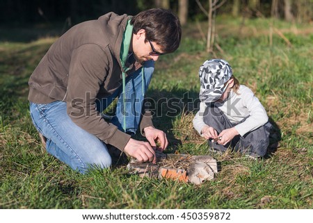 Similar – Image, Stock Photo Little girl putting apple inside of wicker basket