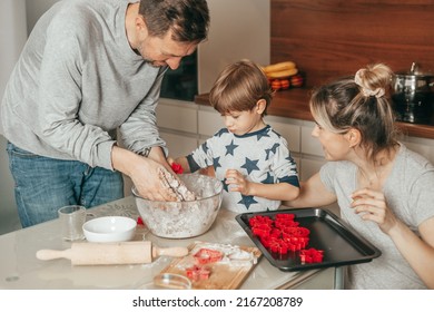 Dad, Son And Mom Are Busy Making Cookie Dough In Kitchen At Home. Family Have Fun Together, Hobby, Teamwork. Happy People.