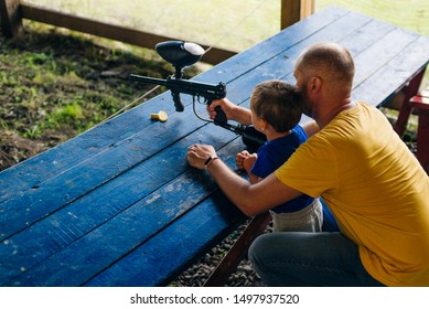 Dad And Son At Shooting Range