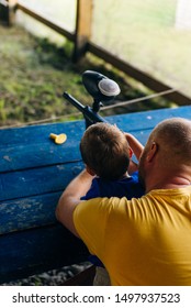 Dad And Son At Shooting Range