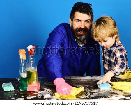 Dad Withsmiling Face And Son With Cleaning Supplies On Blue Background Kid With Father Cleaning Dad Withsmiling Face And Son With Cleaning Supplies On Blue Background Kid With Father Cleaning