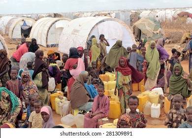 DADAAB, SOMALIA - AUGUST 06: Refugee Camp, Hundreds Of Thousands Of Difficult Conditions, Somali Immigrants Are Staying. African People Waiting To Get In The Water. August 06, 2011 In Dadaab, Somalia.