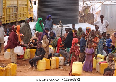 DADAAB, SOMALIA - AUGUST 07: Refugee Camp, Hundreds Of Thousands Of Difficult Conditions, Somali Immigrants Are Staying. African People Waiting To Get In The Water. August 07, 2011 In Dadaab, Somalia.