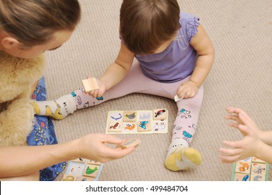 Daddy And Kids Playing Children's Lotto With Figures Of Animals,children Education Development Concept, Father Playing Bingo With Toddler And Educating Child, Happy Parenthood And Childhood 