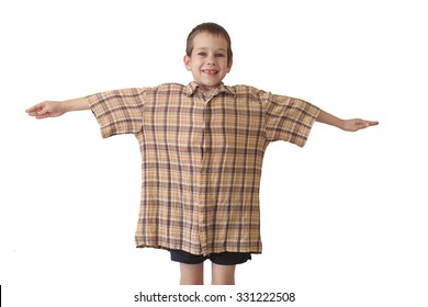 Daddy's Shirt Isolated On White Background. The Boy In Daddy's Shirt Which Is Too Big For Him