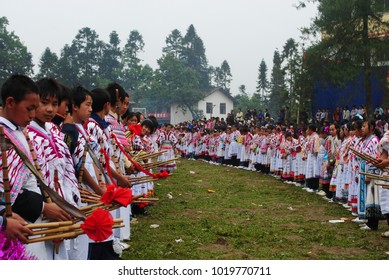 Daguan, Zhaotong, China - 06/16/2010: Miao Boys Assemble With Lusheng On Flower Mountain Festival