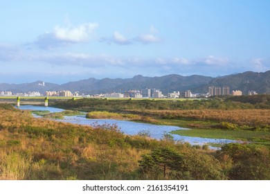 The Dahan River Under Blue Sky In New Taipei City, Taiwan