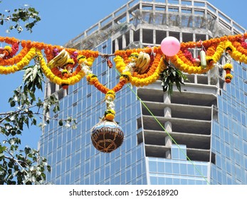 dahi handi festival celebrated in Maharashtra and india. pot hanging with the rope and decorated with flowers called as matki in Maharashtra
